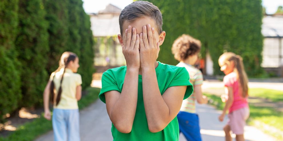 hide-seek-boy-green-tshirt-covering-eyes-with-hands-hiding-children-park-fine-afternoon What Can We Do to End Bullying in School?
