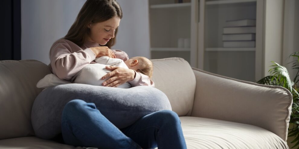 full-shot-mother-with-cute-newborn