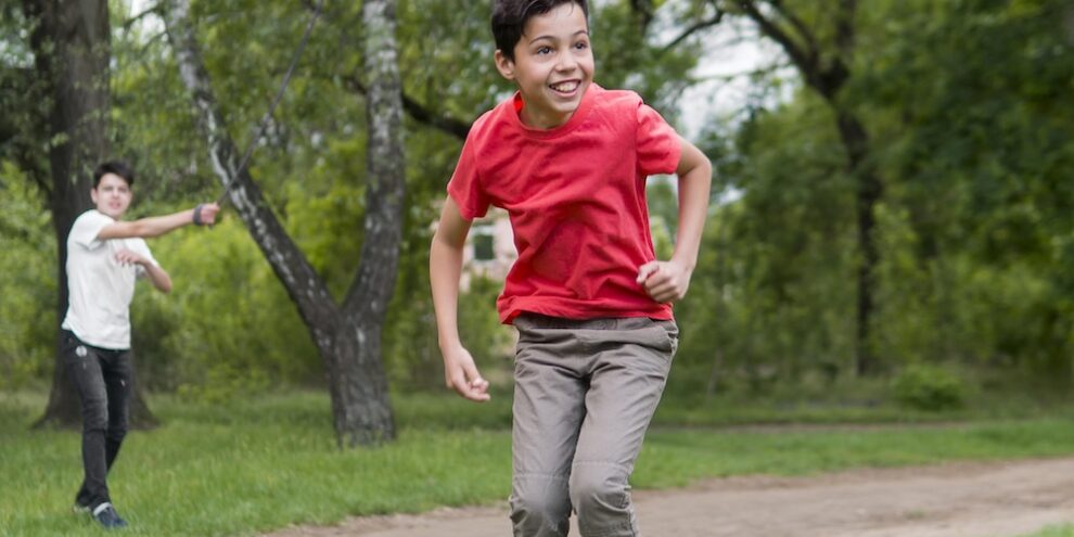 happy-child-red-shirt-playing